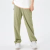 Elastische Sport-Hose mit hohem Bund und Buchstabenprint „Schwarz Olivgrün“