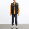Logo Small Patchwork Sports Standkragen-Daunenweste „Multi-Color“